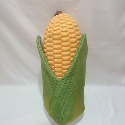 El maíz del maíz de la felpa juega el juguete amarillo del animal doméstico de la historieta