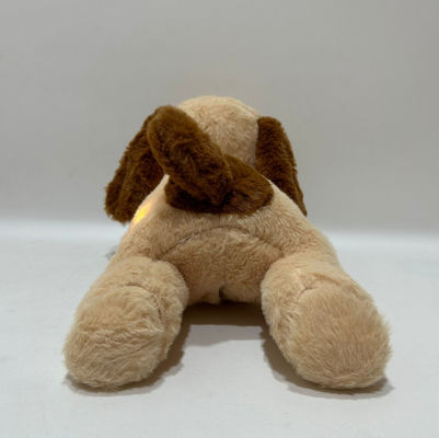 Perrito de peluche con función de luz y música