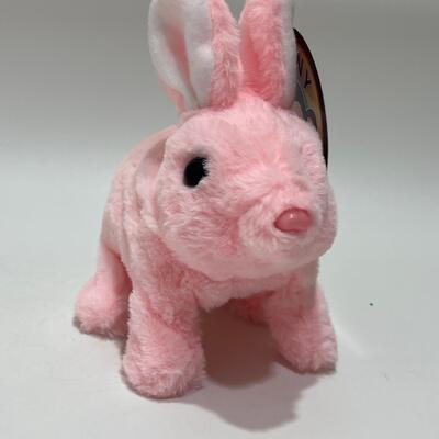 Diseño personalizado Animal relleno lindo lindo conejo saltando juguete de peluche electrónico